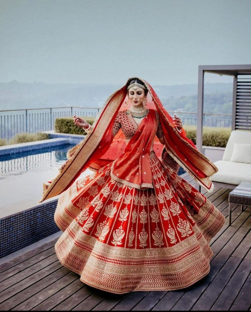 Mouni Roy Bold Red Sabyasachi Lehenga