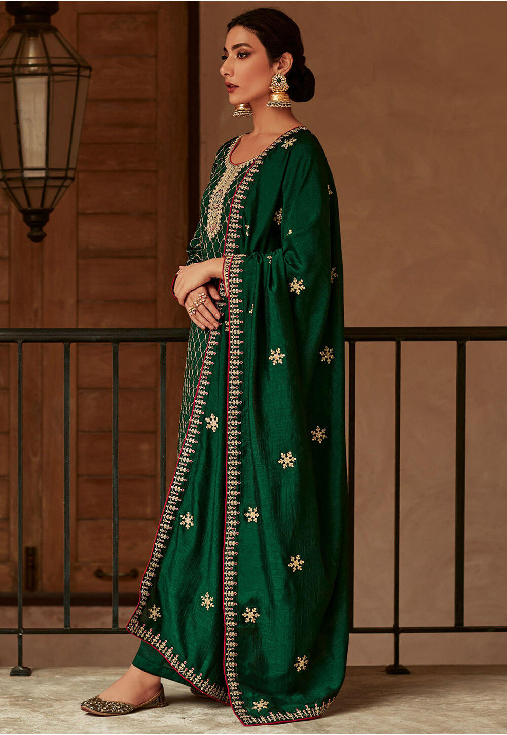 Embroidered Art Silk Pakistani Suit In Dark Green Kch10439