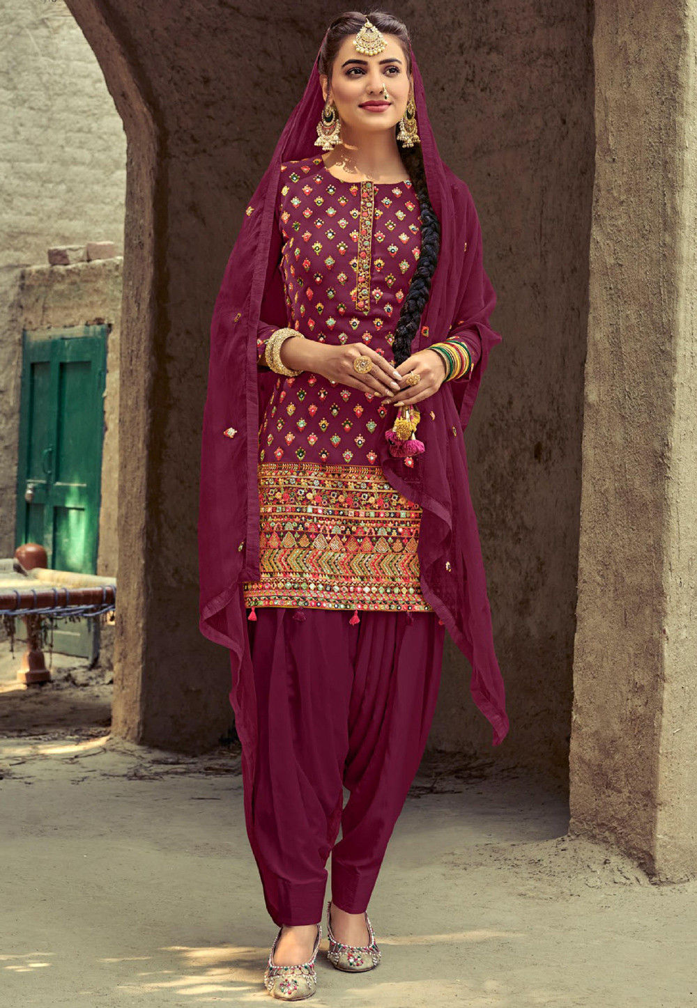 Embroidered Georgette Punjabi Suit in Magenta : KCH6197