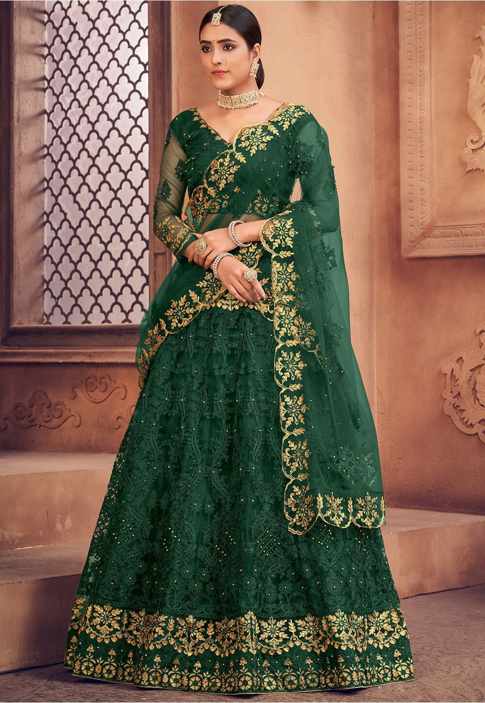 Buy Green Thread Work Net Wedding Wear Lehenga Choli from Ethnic Plus.
