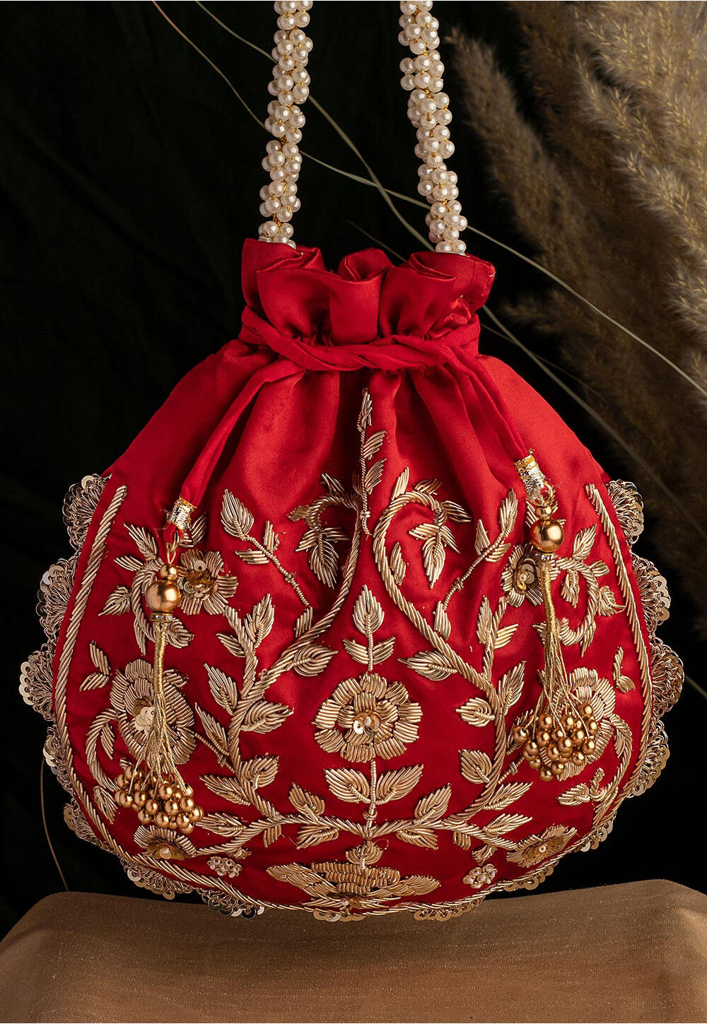 Hand Embroidered Art Silk Potli Bag in Red