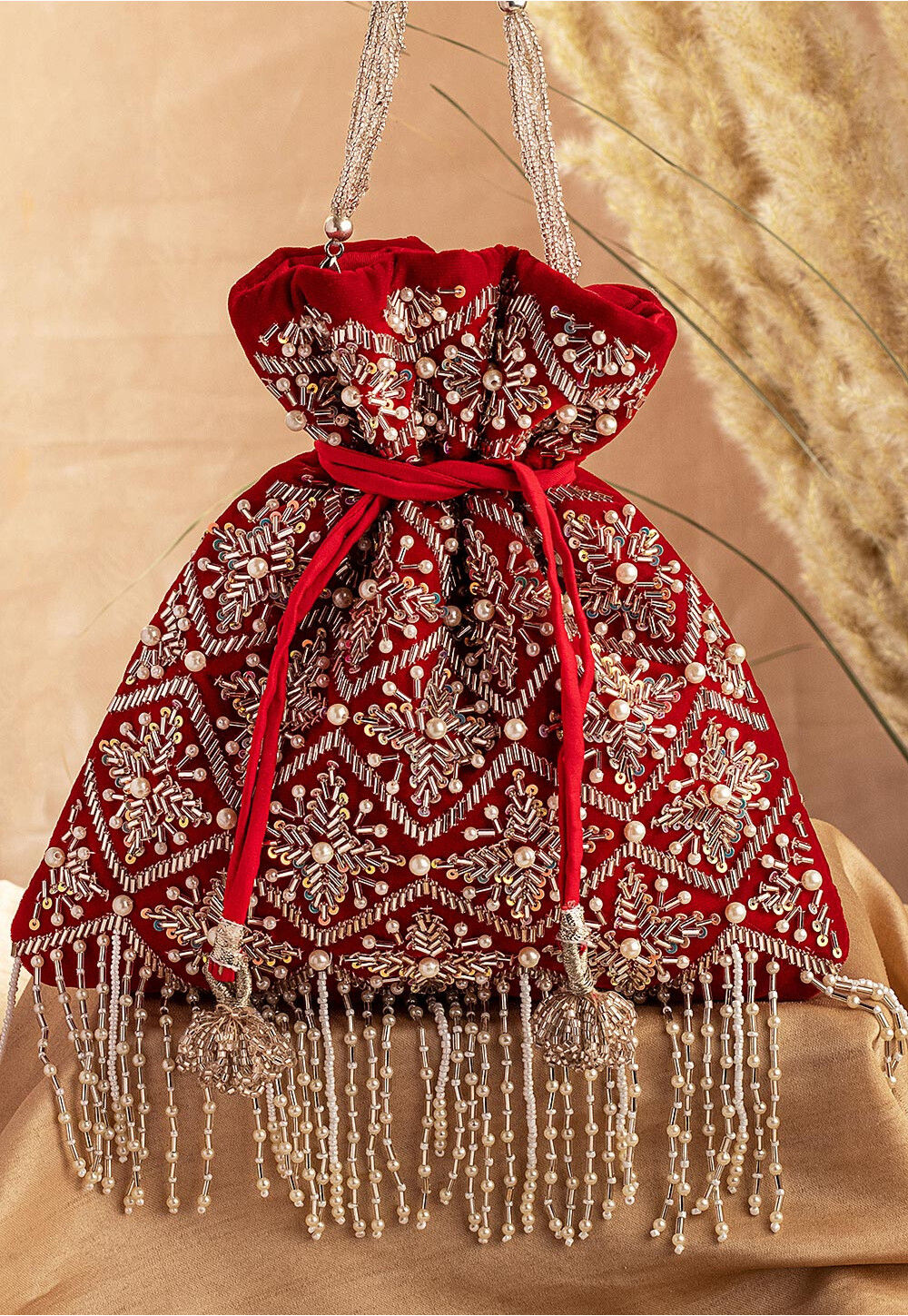 Hand Embroidered Velvet Potli Bag in Red