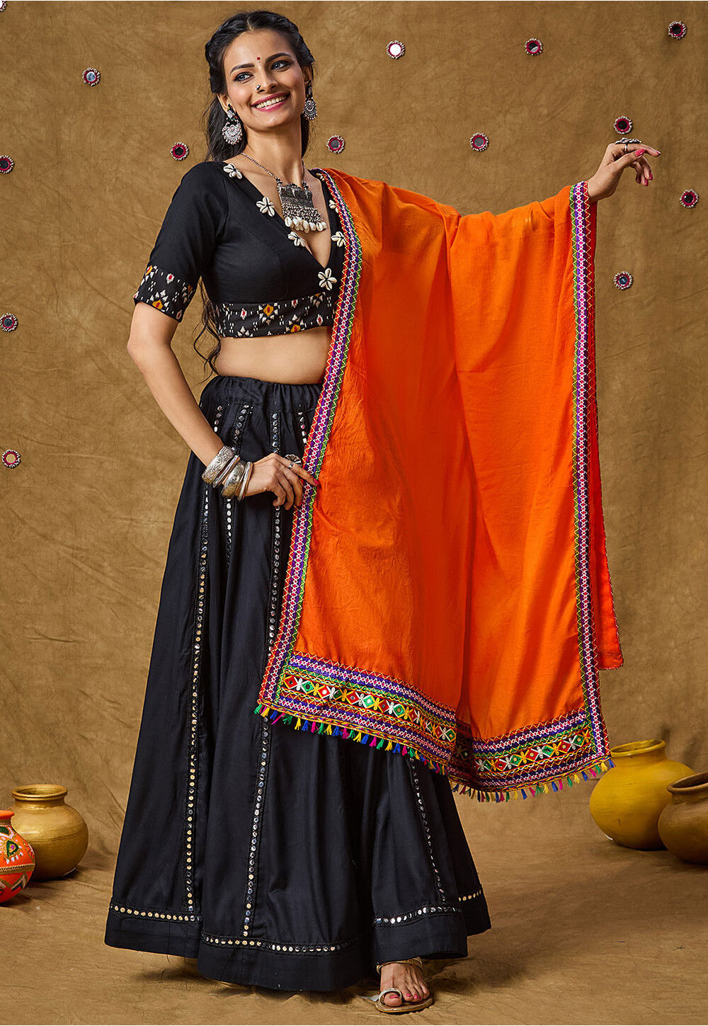 black dress with orange dupatta The simplest ways to make the best of Black Salwar Kameez design