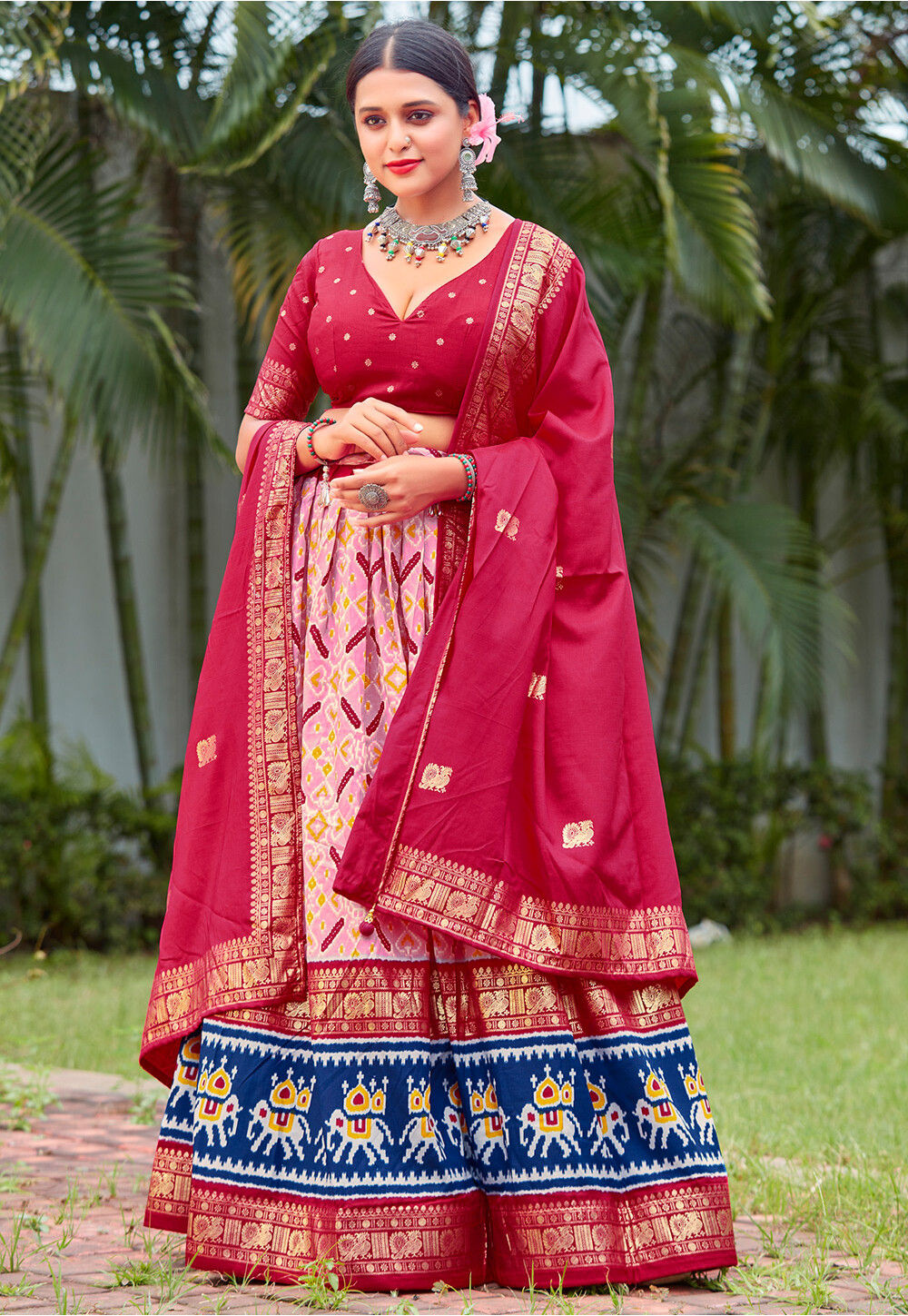 Ahana Ghai in HOT PINK PRINTED PATOLA LAYERED LEHENGA