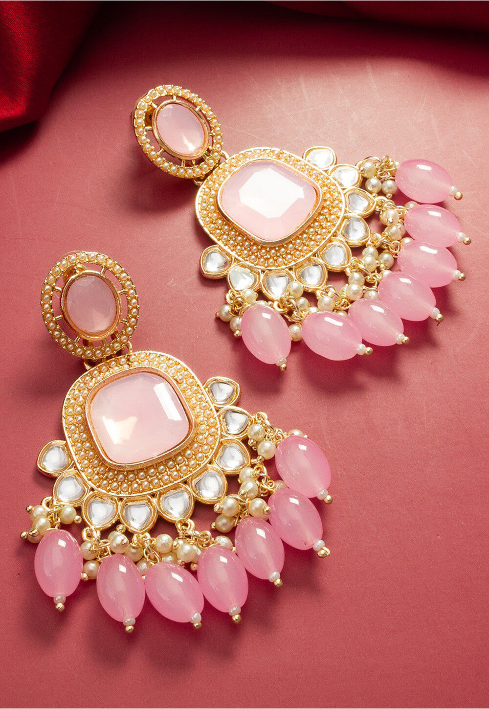 Ad stone sales studded earrings