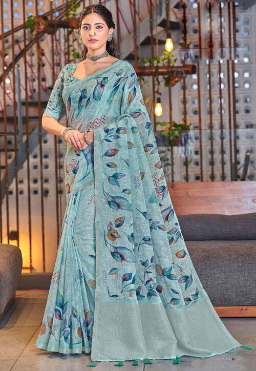 Olive green spiral batik printed linen cotton saree, contrast piping border, floral printed pallu, and a contrast floral printed blouse main image 1