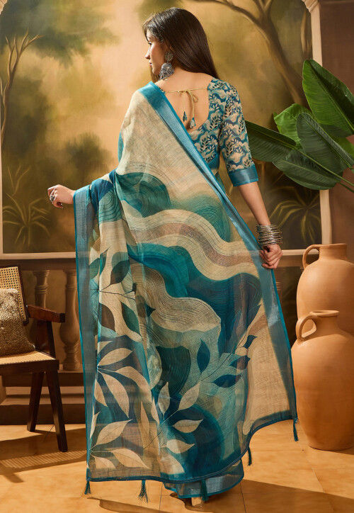 Olive green spiral batik printed linen cotton saree, contrast piping border, floral printed pallu, and a contrast floral printed blouse
