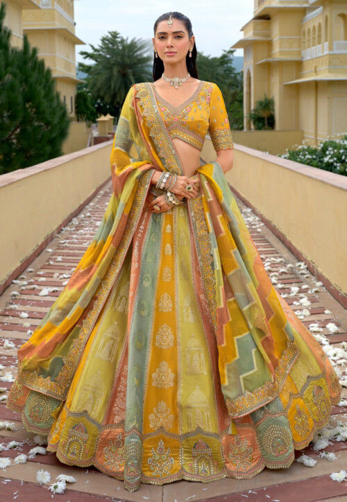 Embroidered Art Silk Jacquard Lehenga in Green and Mustard