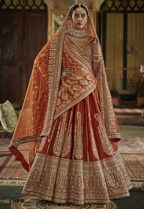 Embroidered Art Silk Lehenga in Rust