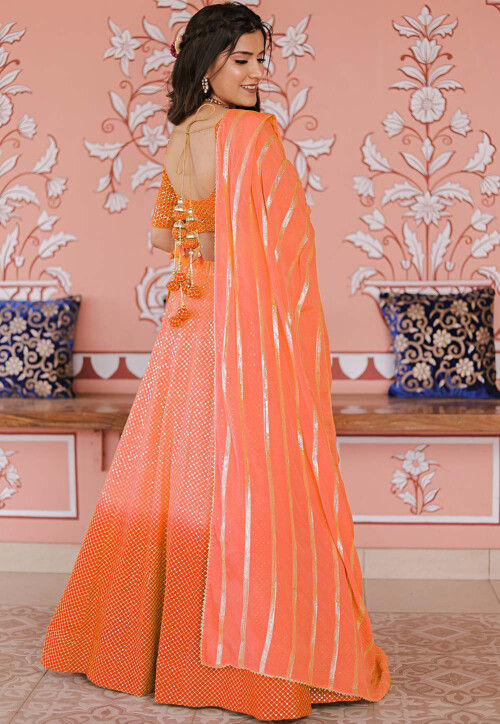Embroidered Art Silk Lehenga in Shaded Orange