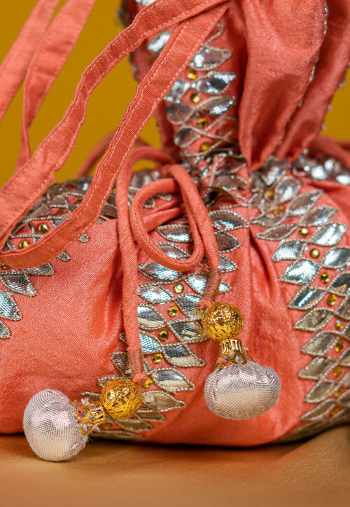 Embroidered Art Silk Potli Bag in Peach