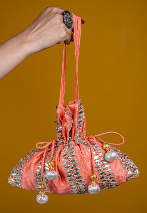 Embroidered Art Silk Potli Bag in Peach