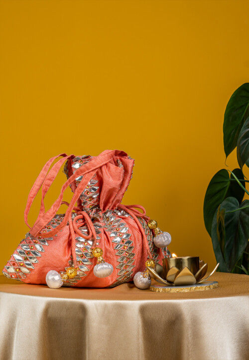Embroidered Art Silk Potli Bag in Peach