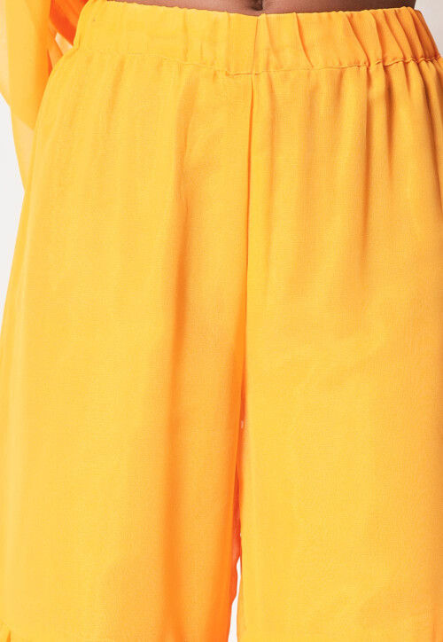 Embroidered Georgette Pakistani Suit in Yellow