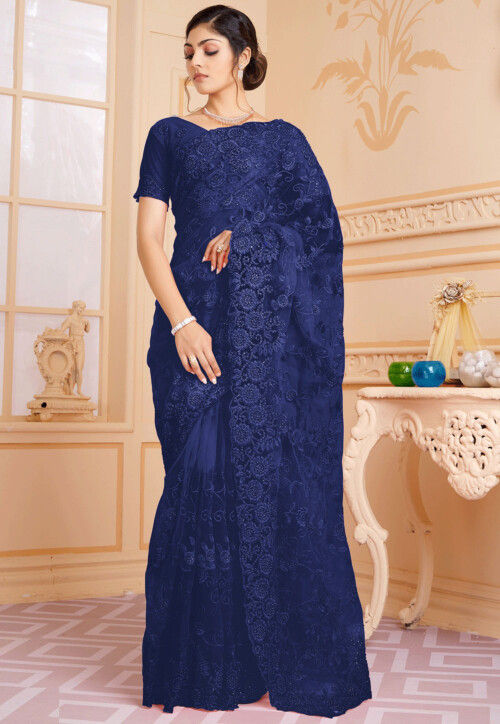 An A-line side pocket gown in yellow, wine, emerald, royal blue, or red.