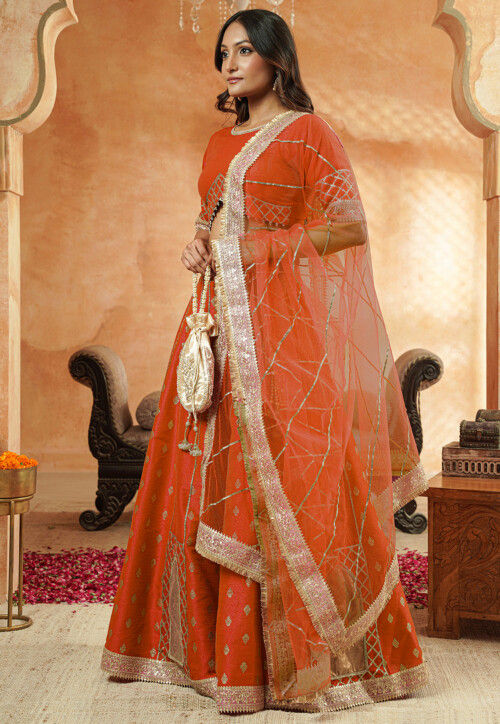 Foil Printed Dupion Silk Lehenga in Orange