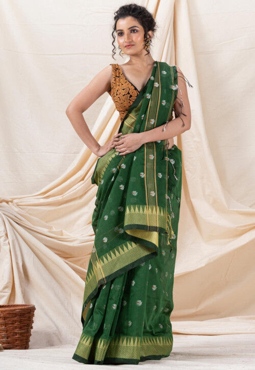 Borderless dark green poly cotton saree with unique buttas on its body,  self-pallu of intricate designs