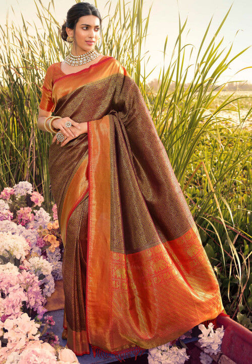 Woven Art Silk Saree in Maroon and Golden