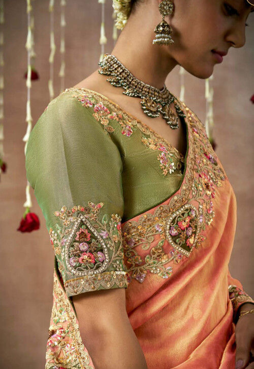 Coral Orange Organza Silk Saree with Floral Prints and Woven Zari Border