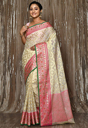 Buy Nyri Cream Art Silk Woven Zari Festive Saree & Unstitched Blouse online