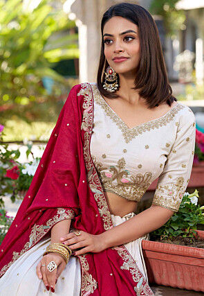 Embroidered Art Silk Lehenga in Cream
