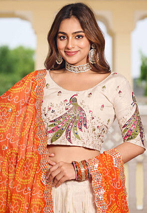 Embroidered Art Silk Lehenga in Cream