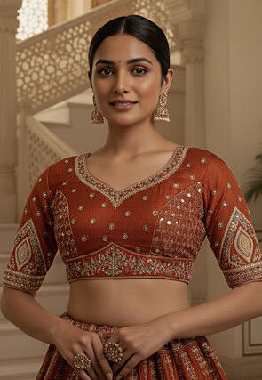 Embroidered Art Silk Lehenga in Orange