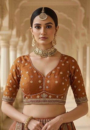 Embroidered Art Silk Lehenga in Rust
