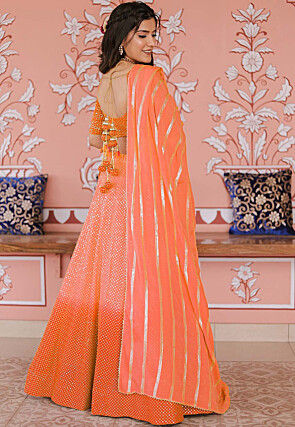 Embroidered Art Silk Lehenga in Shaded Orange