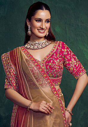 Embroidered Border Tissue Silk Saree in Rose Gold