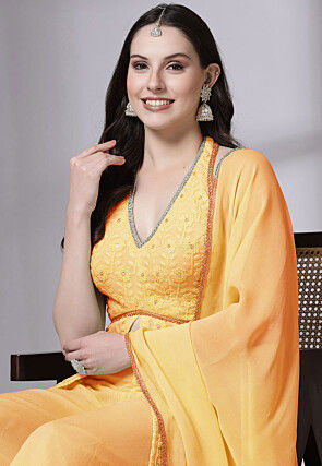Embroidered Georgette Pakistani Suit in Mustard