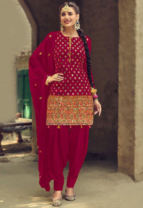 Embroidered Georgette Punjabi Suit in Magenta 
