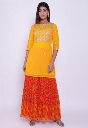 Embroidered Georgette Straight Kurti in Yellow