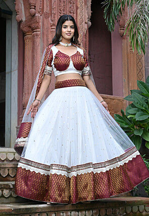 Embroidered Net and Art Silk Jacquard Lehenga in White