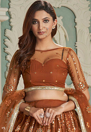 Embroidered Net Lehenga in Rust