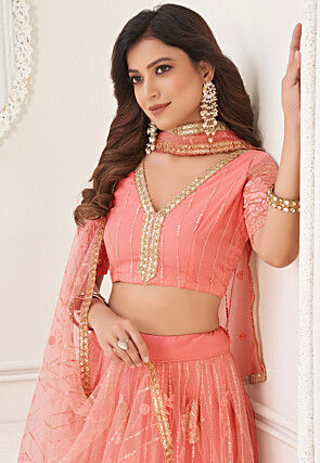Embroidered Net Lehenga in Peach