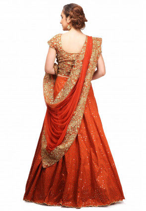 Embroidered Scalloped Art Silk Lehenga in Rust