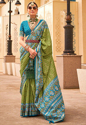 Shop Green lycra saree with foil print Party Wear Online at Best