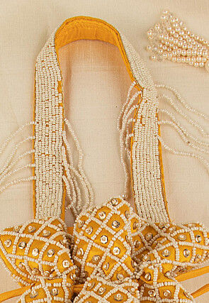 Hand Embroidered Art Silk Potli Bag in Mustard