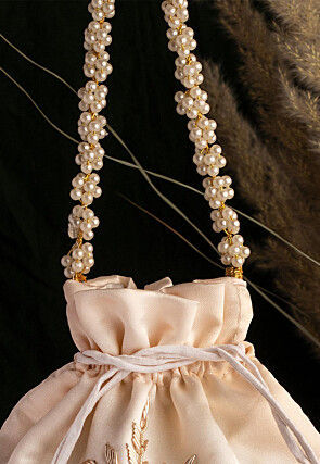 Hand Embroidered Art Silk Potli Bag in Off White