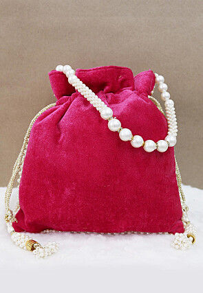 Hand Embroidered Velvet Potli Bag in Fuchsia