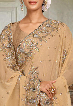 Hand Embroidered Viscose Georgette Saree in Beige