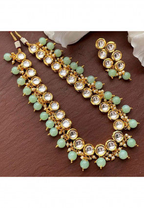Green kundan set online on sale