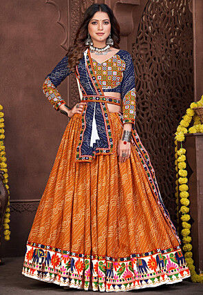 Sampradaya - 068. Elegance Redefined. Available . Stunning blue and orange  color combination lehenga and blouse with net