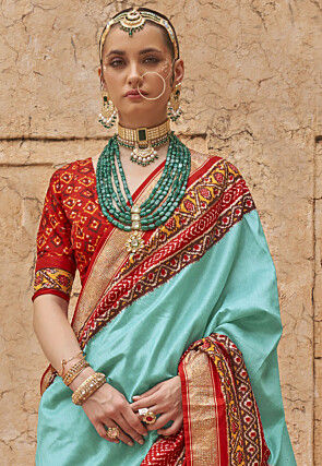 Patola Printed Art Viscose Silk Saree in Sky Blue and Red