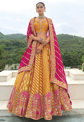Woven Art Silk Lehenga in Mustard and Pink