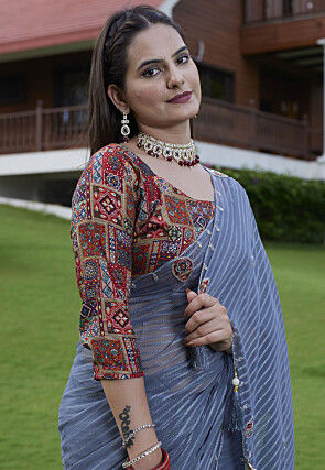 Woven Georgette Jacquard Scalloped Saree in Blue