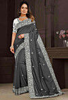Embroidered Art Silk Scalloped Saree in Black