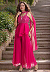 Embroidered Georgette Pakistani Suit in Fuchsia