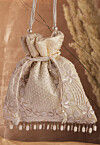 Hand Embroidered Art Silk Potli Bag in Off White